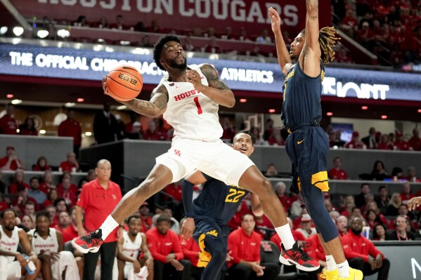 Houston the lone unbeaten team in college hoops jumps Kansas to